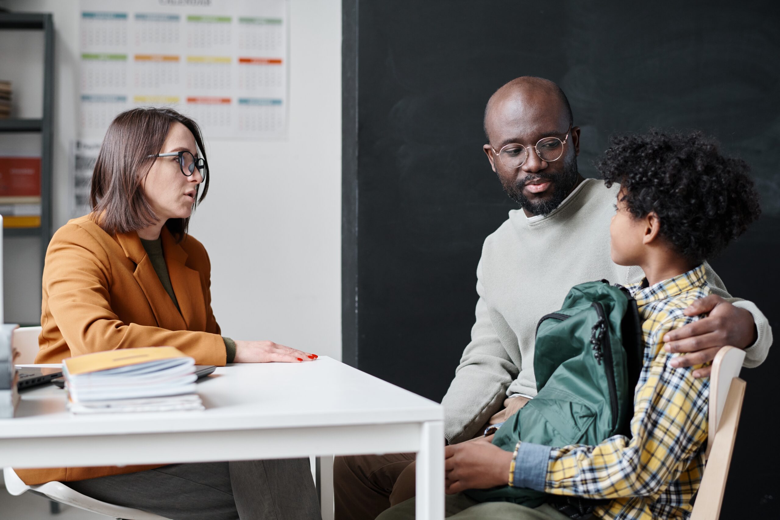 Teacher,Having,Conversation,With,Parent
