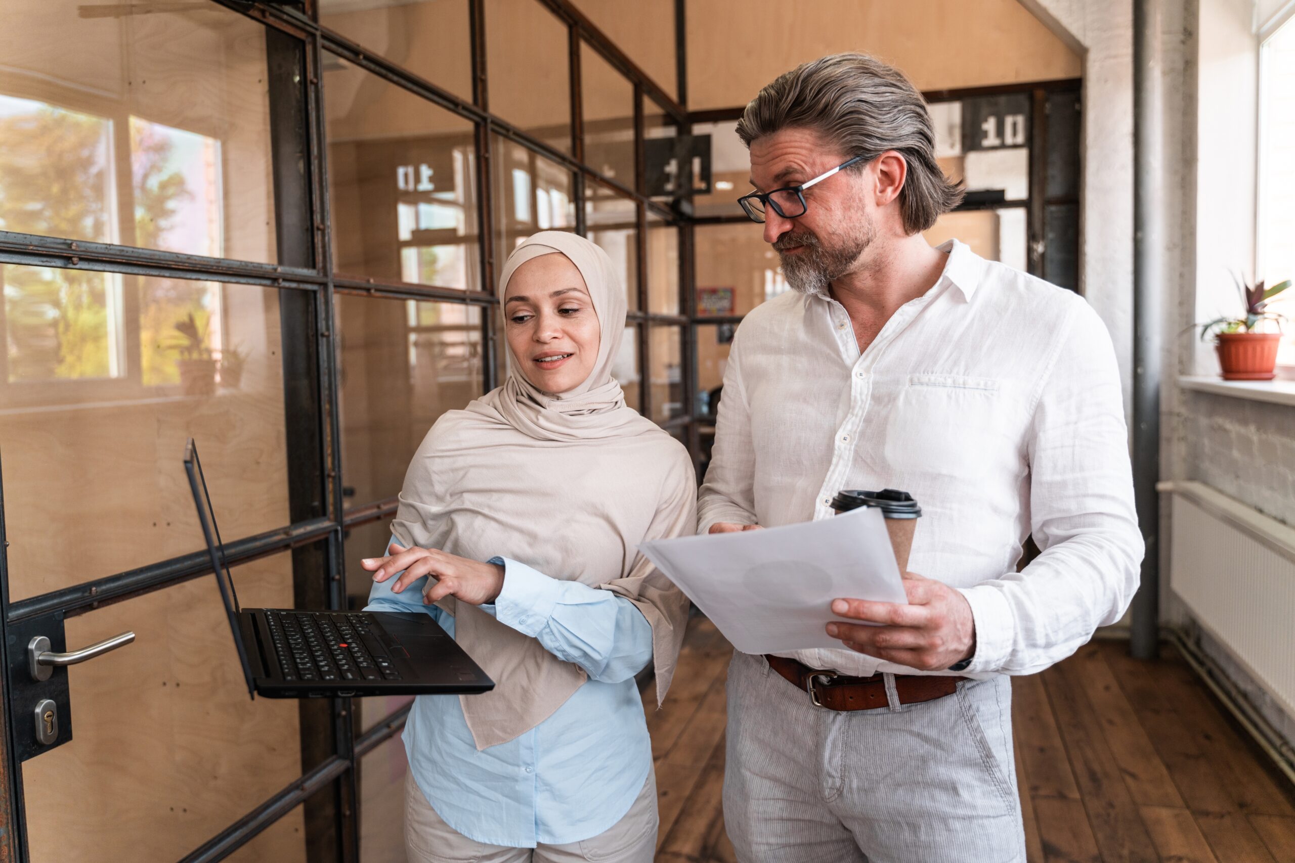 Employees,Working,In,The,Office.,Multiethnic,Start,Up,Group,Developing
