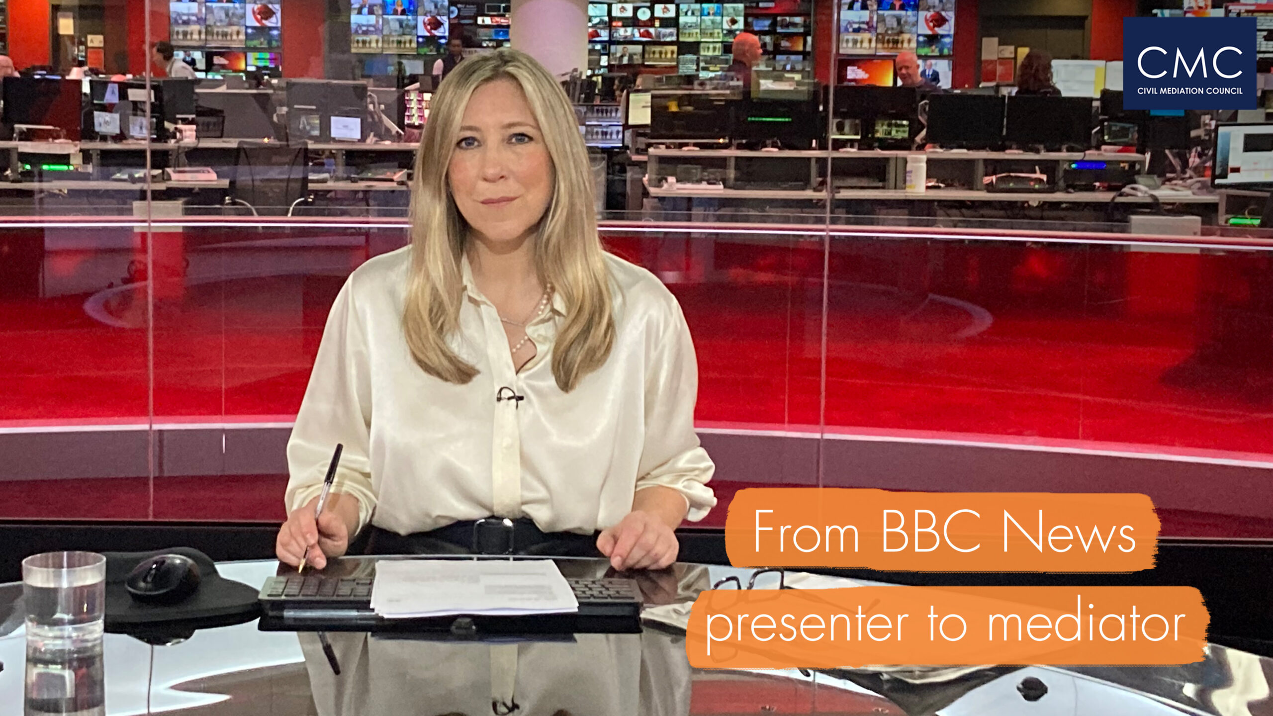 Joanna Gosling presenting the news in BBC studio directly facing the camera