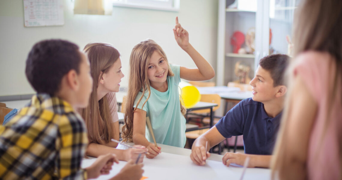 Group of children in school having a discussion