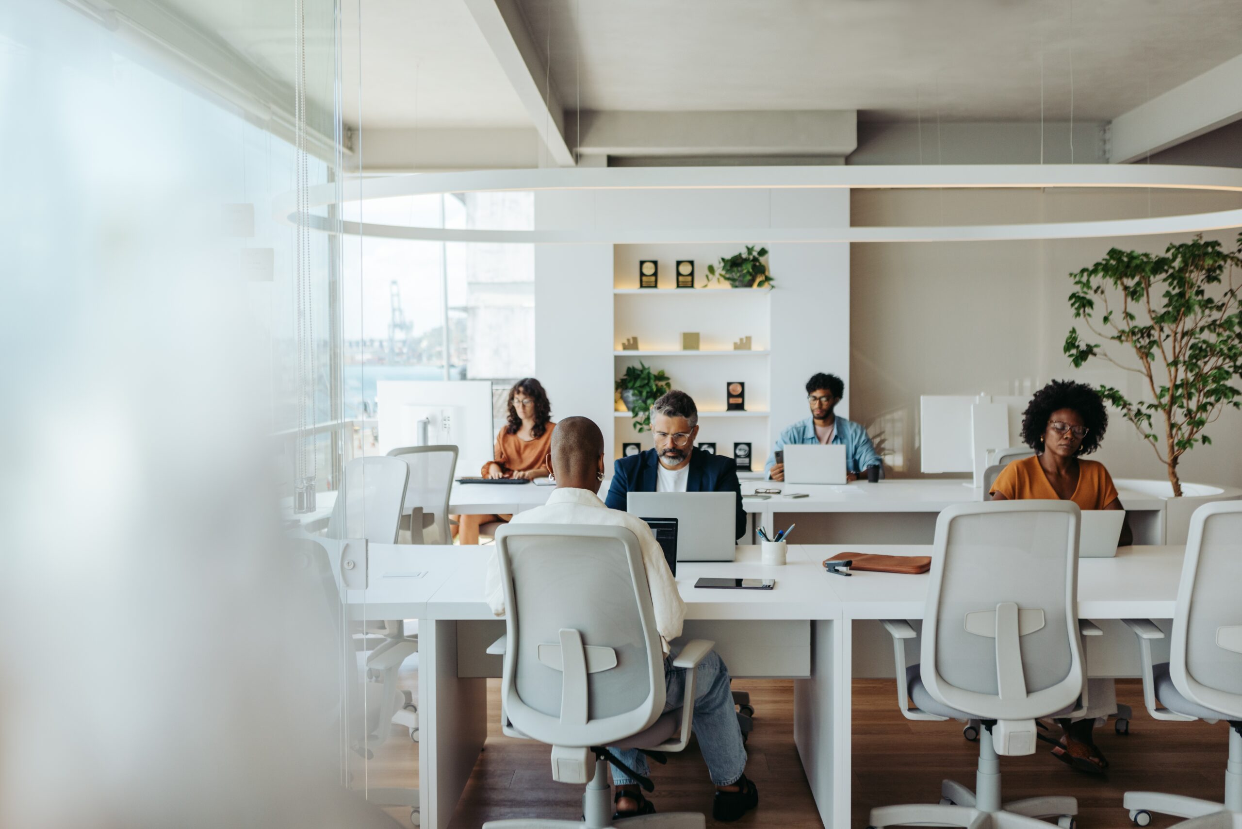 Business,Professionals,Working,Together,In,A,Diverse,Coworking,Office.,They