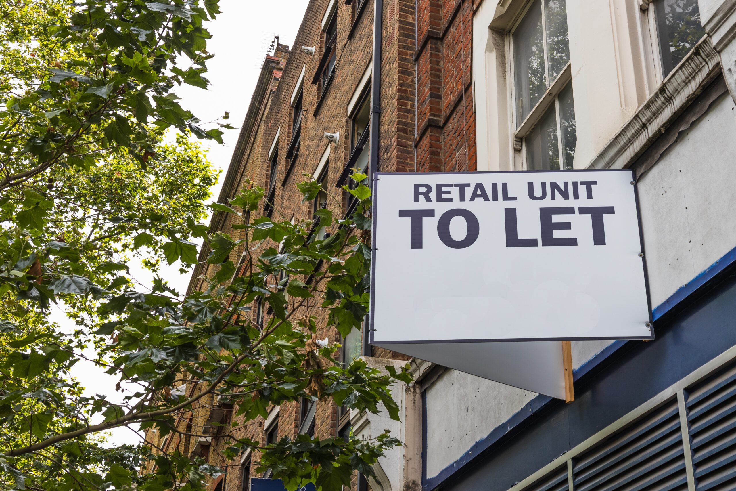 Retail,Unit,To,Let,Sign,On,Uk,High,Street,Storefront,